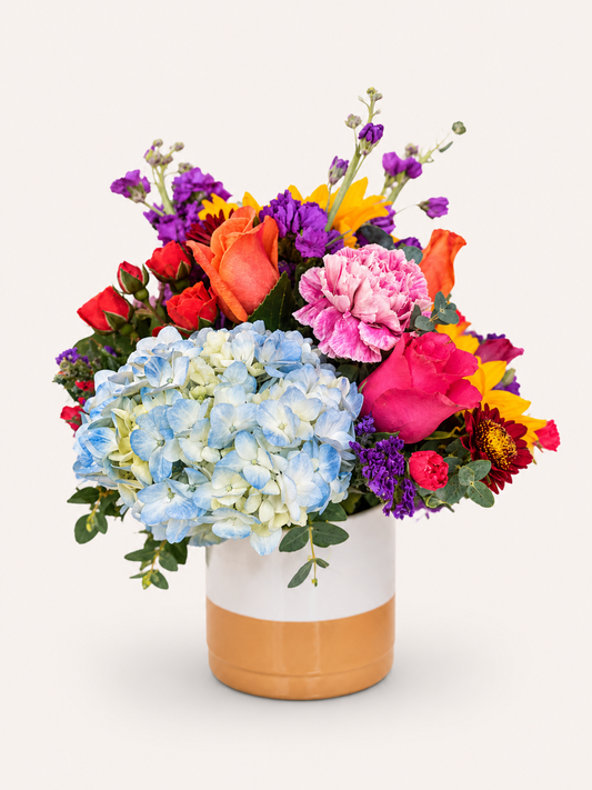 Colorful Moments small mixed flower arrangement with hydrangea, roses and seasonal blooms
