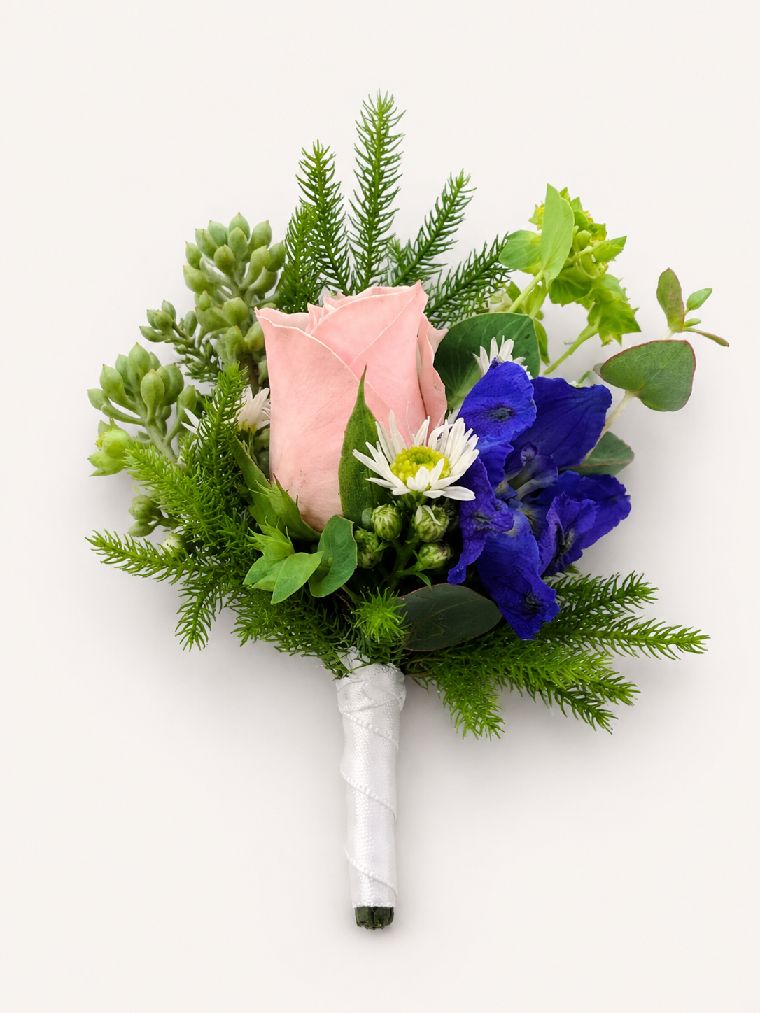 Pink and blue wedding boutonniere with greenery by The Paradise of Flowers