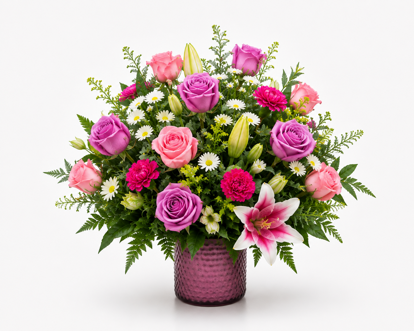 Blushing Garden pink floral arrangement in a decorative vase