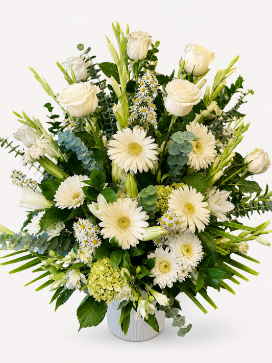 Graceful Remembrance white funeral flower arrangement in Fort Myers