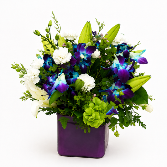 Colorful small cube flower arrangement in a square glass vase