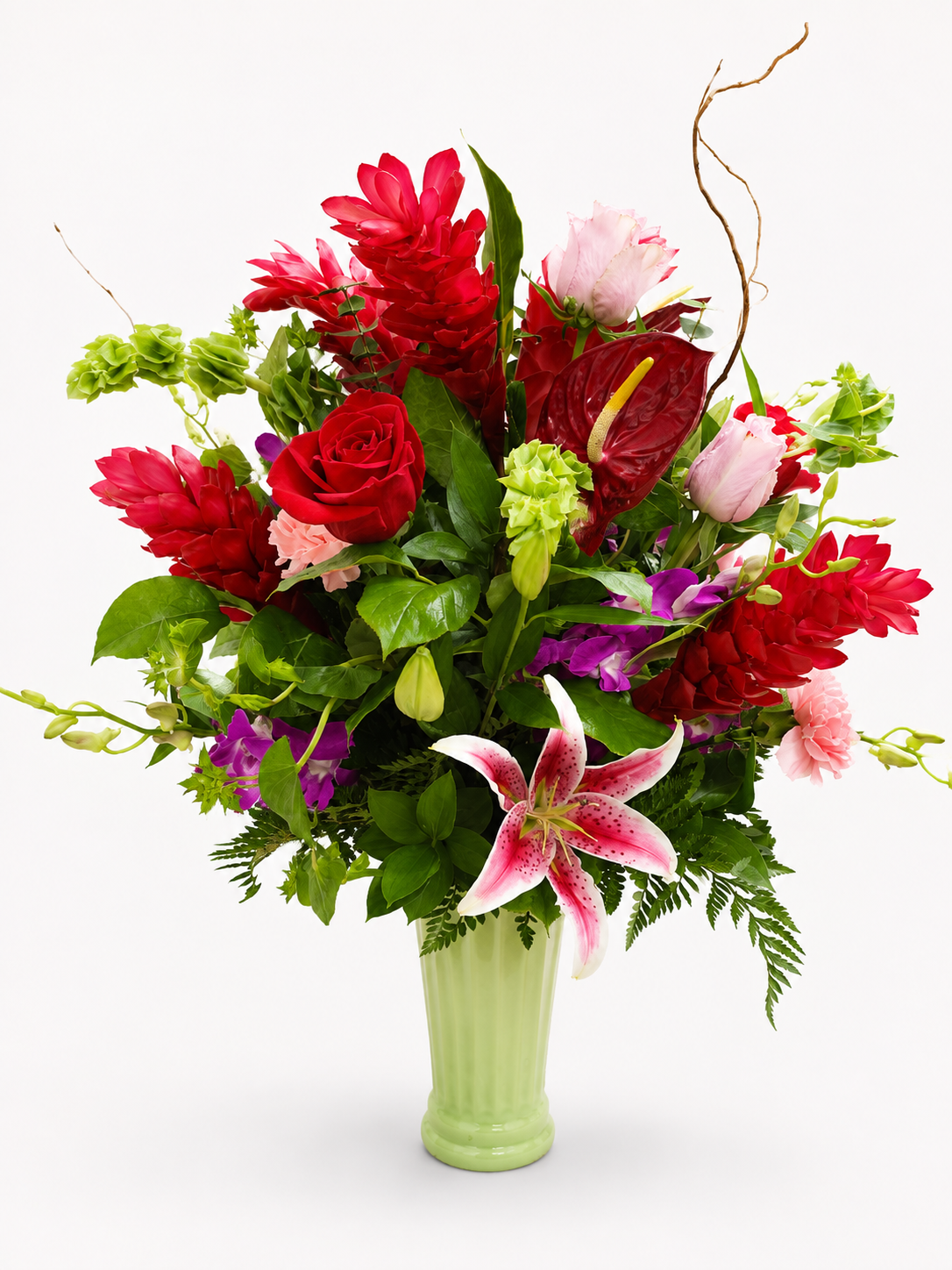 Velvet Kiss romantic red pink and white floral arrangement in a purple vase